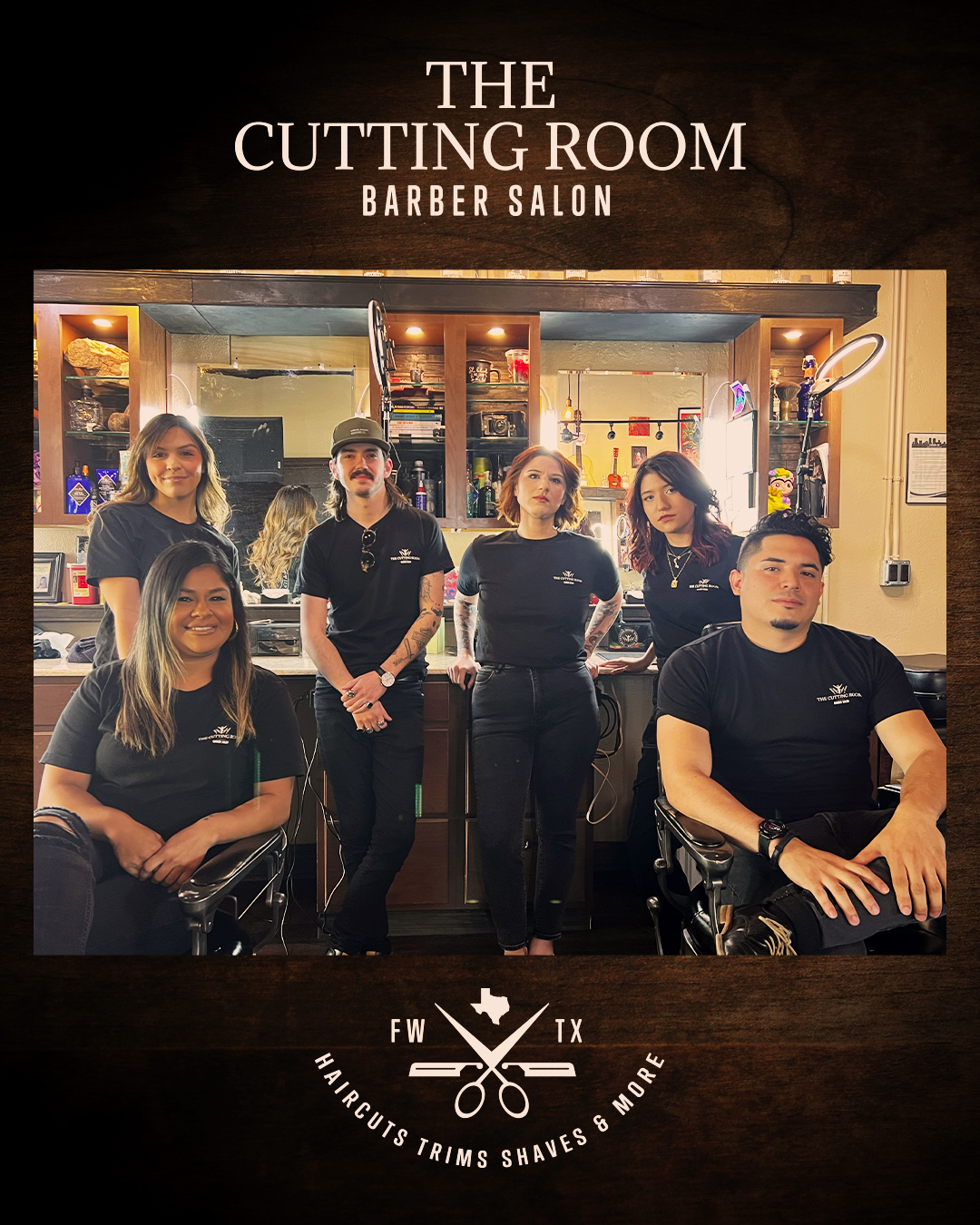 Six stylists pose for a picture. The image is on a dark wood grain background with a simplified version of the logo below it. This logo features only two razor blades and the location – Ft. Worth, Texas.